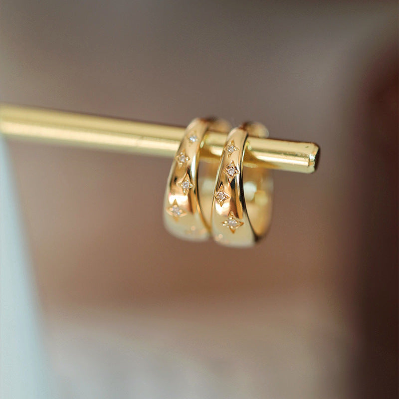 Luxuriöse Gold- und Silberohrringe