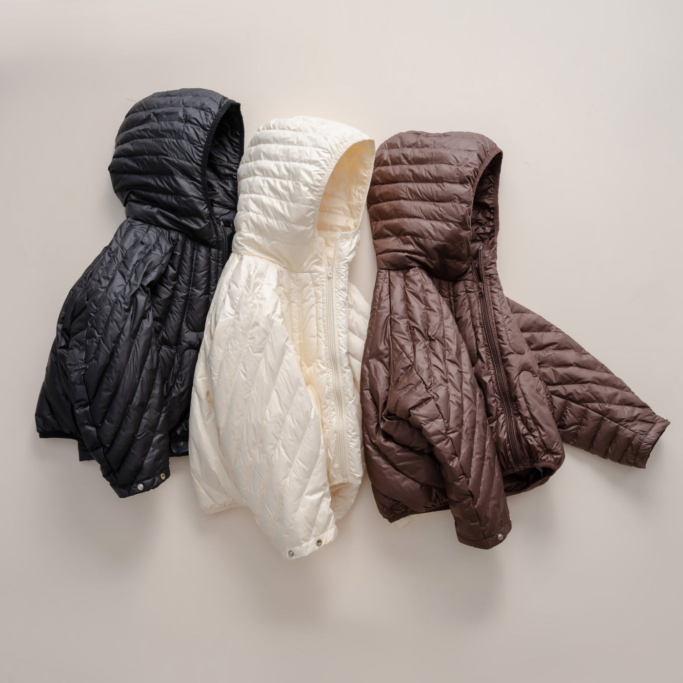 Damen gesteppte Jacke mit Kapuze und trendigem Design Heidi-Mode