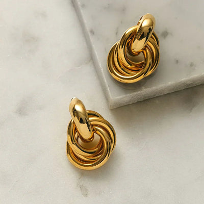 Aussage Interlocking Ohrringe | Gold
