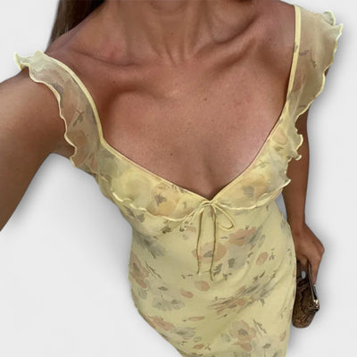 Maxikleid mit geheimnisvollem Blumenmuster und tiefem Ausschnitt