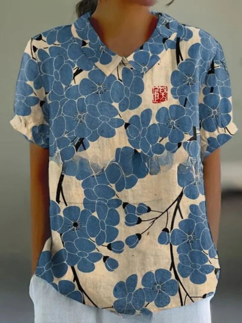 Damen Polo mit floralem Stickmuster und kurzen Ärmeln