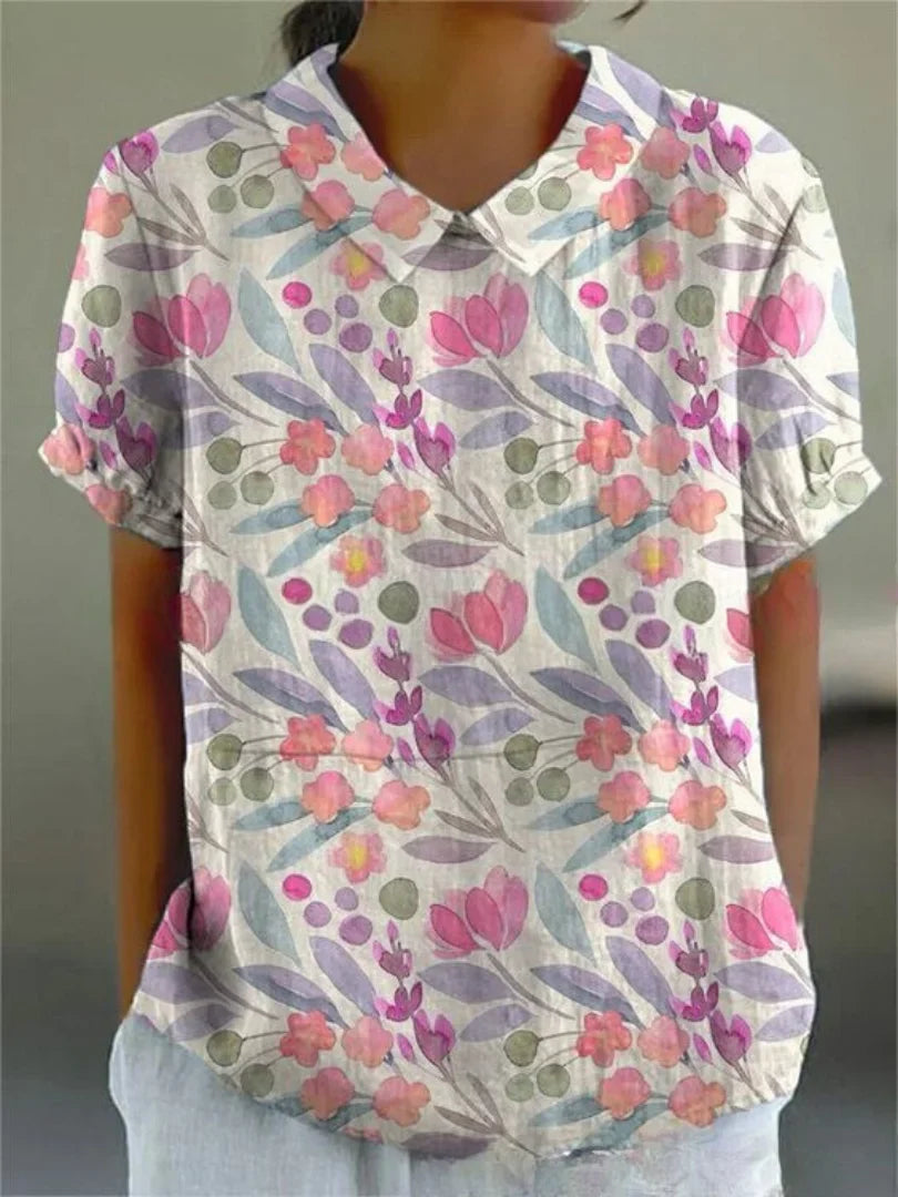 Damen Polo mit floralem Stickmuster und kurzen Ärmeln