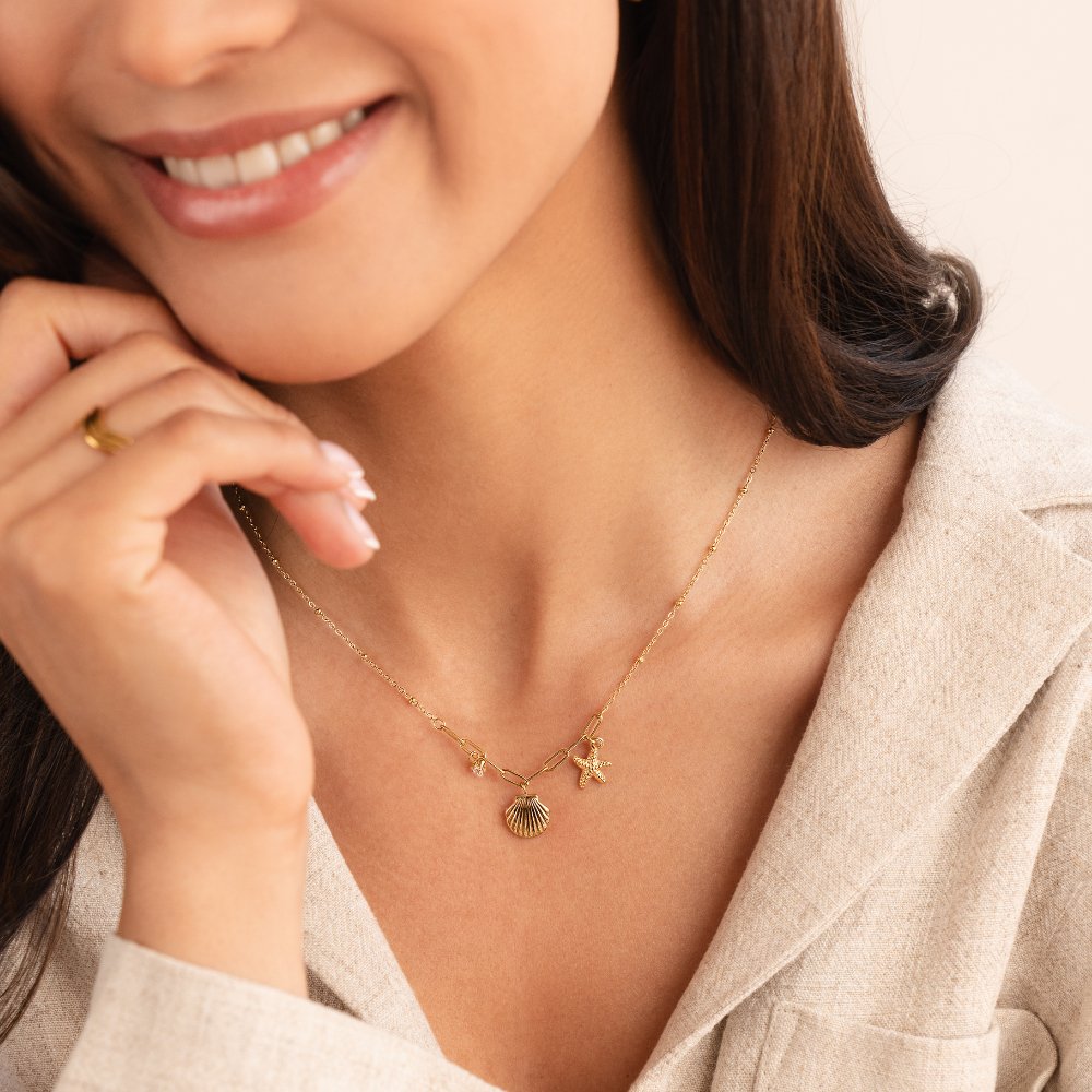 Goldene Muschel &amp; Seestern Halskette