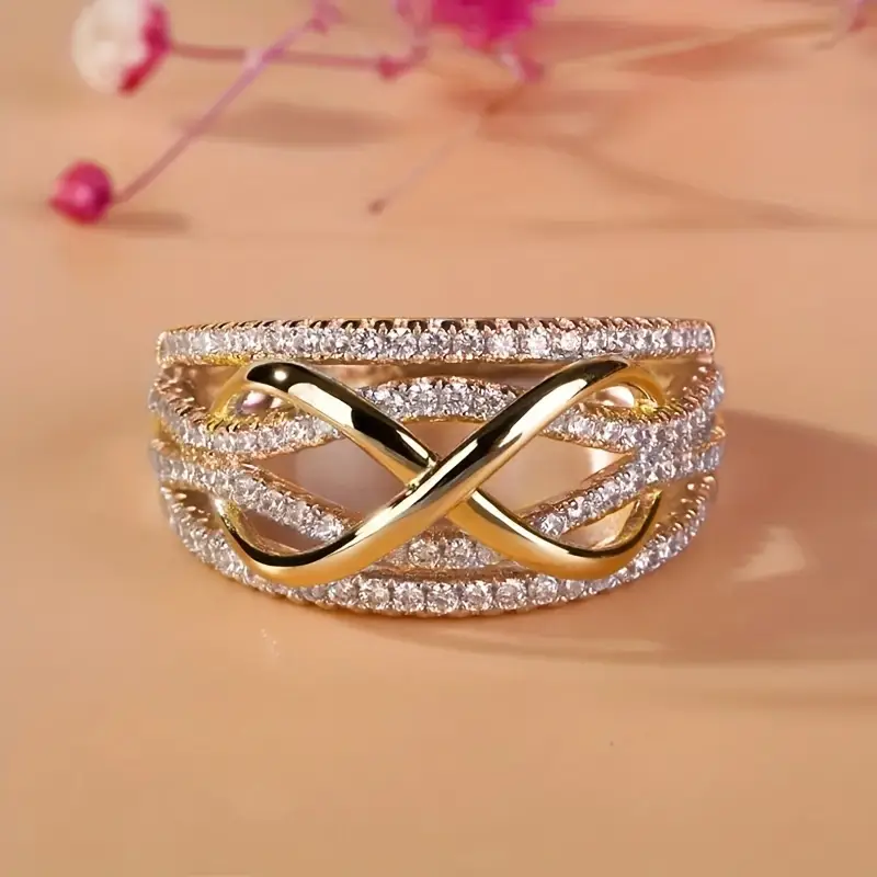 Goldring mit „Infinity“-Zeichen und Zirkonia